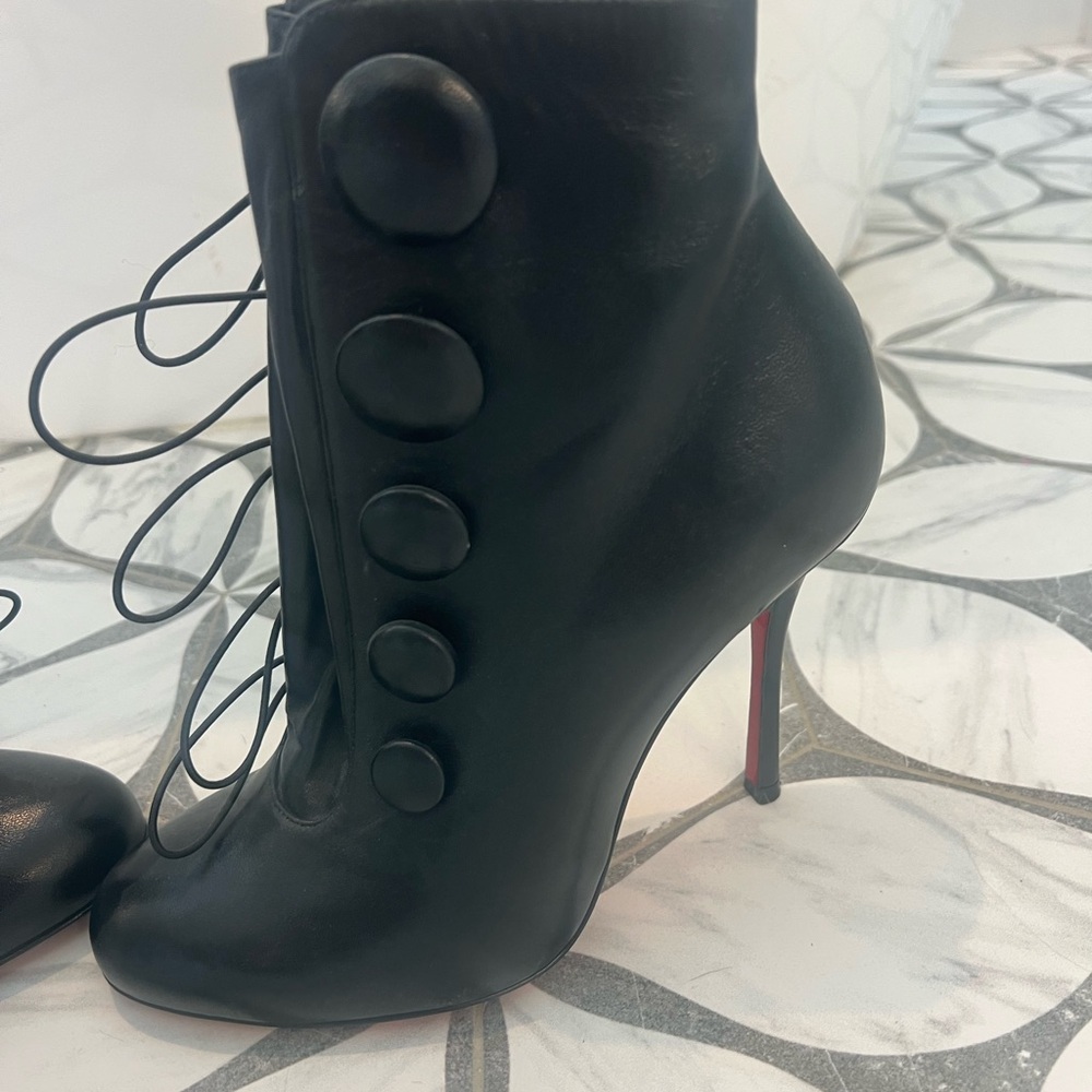 Christian Louboutin Black Heeled Boot with button closure